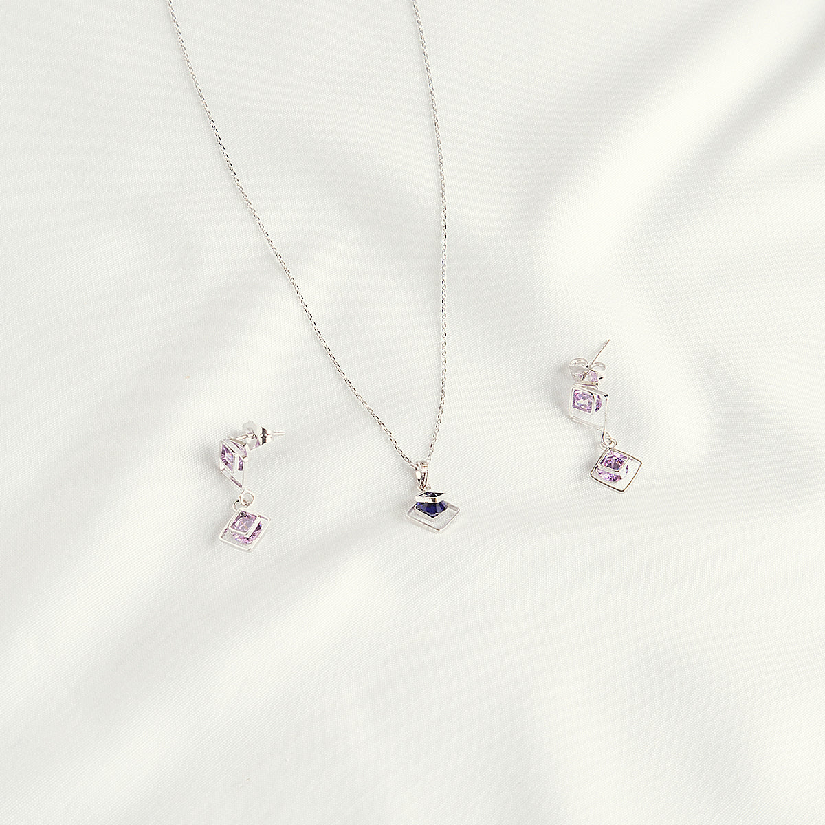 CHARISMATIC LOCKET & EARRINGS SET